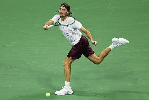 Stefanos Tsitsipas, of Greece, returns the ball to Ben Shelton, of the United States, during the fourth round of the U.S. Open tennis championships, Sunday, Sept. 6, 2026, in New York. 