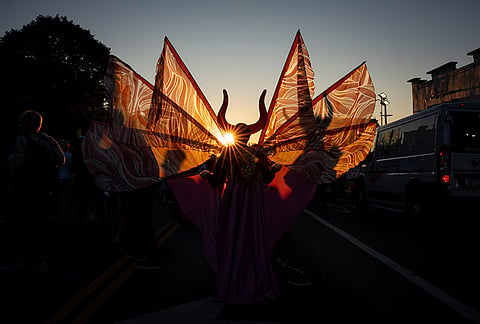 People participate in J'Ouvert festivities ahead of the West Indian Day Parade at sunrise on Labor Day in the Crown Heights and Flatbush neighborhoods of Brooklyn, Monday, Sept. 7, 2026, in New York. 