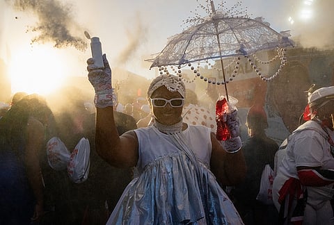 People participate in J'Ouvert festivities ahead of the West Indian Day Parade at sunrise on Labor Day in the Crown Heights and Flatbush neighborhoods of Brooklyn, Monday, Sept. 7, 2026, in New York. 
