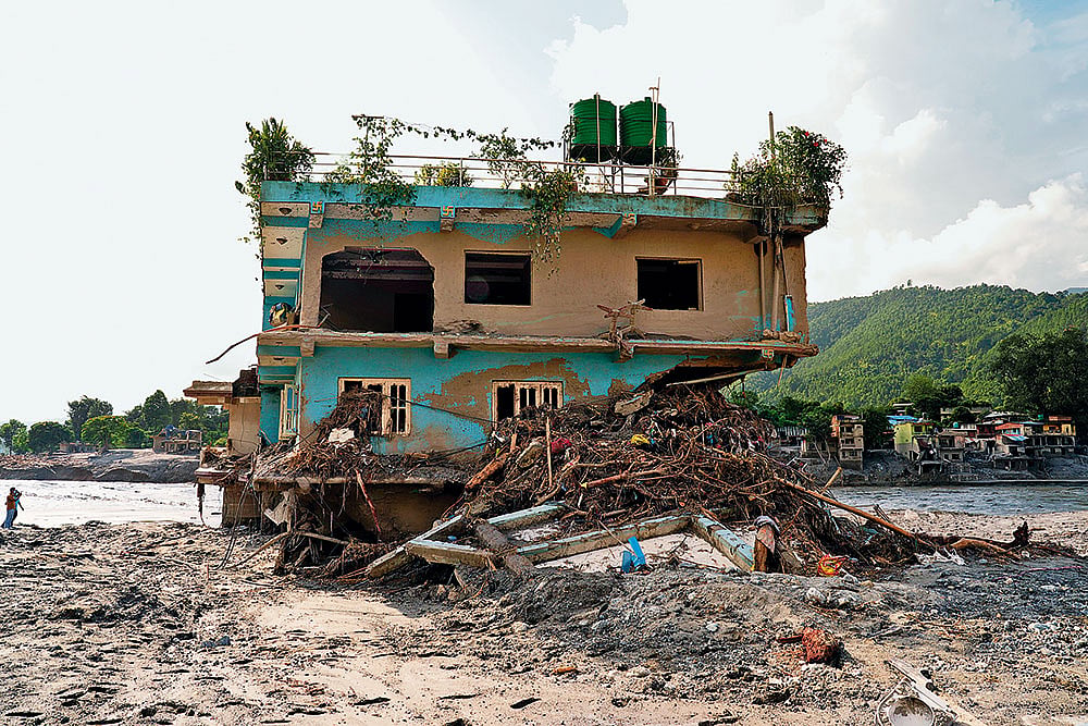 A lone house stands intact in Devighat in Nuwakot district