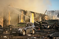 | Photo: AP/Efrem Lukatsky : Rescue workers put out a fire of a building destroyed after a Russian missile attack in Kyiv, Ukraine, Tuesday, Sept. 8, 2026. 