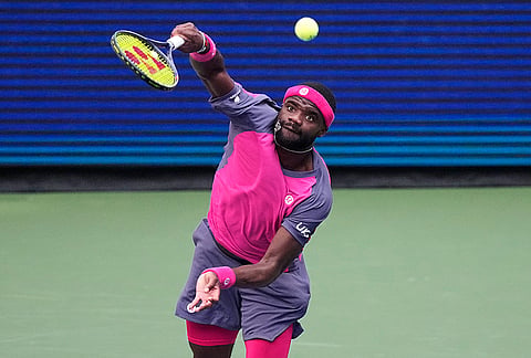 Frances Tiafoe, of the United States, serves to Daniil Medvedev, of Russia, during the fourth round of the U.S. Open tennis championships, Sunday, Sept. 6, 2026, in New York. 