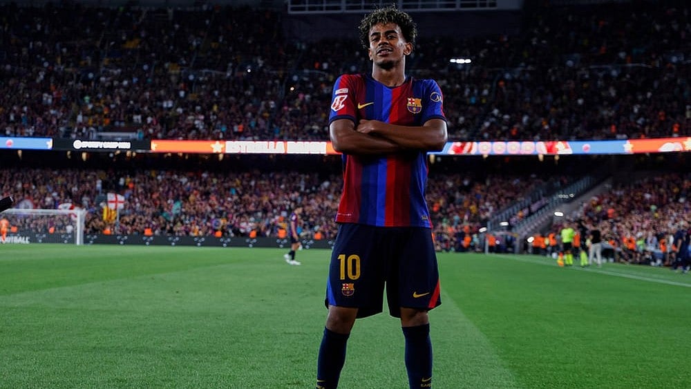 Barcelona's Lamine Yamal celebrates after scoring his side's fifth goal during a Spanish La Liga soccer match between Barcelona and Rayo Vallecano in Barcelona, Spain, Monday, Aug. 31, 2026.  - | Photo: AP/Joan Monfort