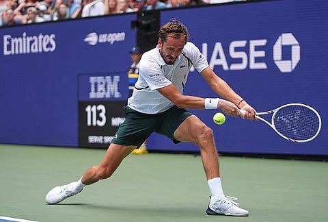 Daniil Medvedev, of Russia, returns the ball to Frances Tiafoe, of the United States, during the fourth round of the U.S. Open tennis championships, Sunday, Sept. 6, 2026, in New York.