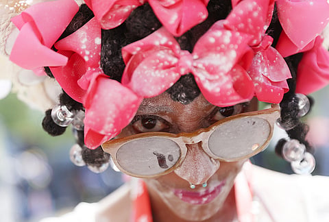 Members of the Belmont Baby Dolls pose for a photo as they wait for the start of the West Indian Day Parade on Monday, Sept. 7, 2026, in the Brooklyn borough of New York. 