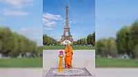 X@BAPSParis : Mahant Swami Maharaj at the Eiffel Tower, during the Nagar Yatra as part of the opening celebrations of BAPS Swaminarayan Hindu Mandir