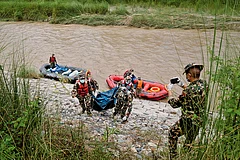 The Vulnerable Downstream: Nepali soldiers recover the bodies of flash flood victims from a river in Chitwan, Nepal, on August 31, 2026 - | Photo: AP
