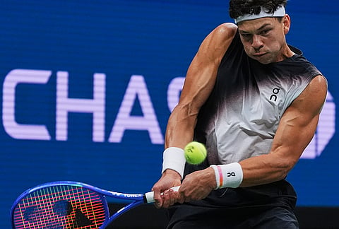 Ben Shelton, of the United States, returns the ball to Stefanos Tsitsipas, of Greece, during the fourth round of the U.S. Open tennis championships, Sunday, Sept. 6, 2026, in New York. 