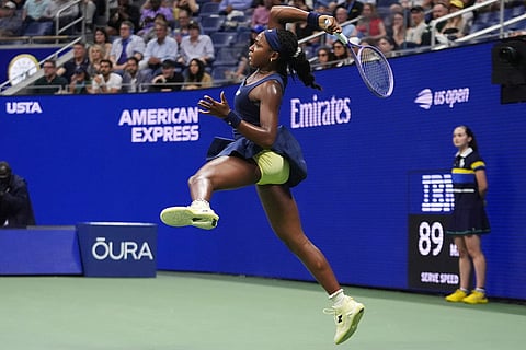Coco Gauff, of the United States, follows through on a shot to Iva Jovic, of the United States, during the fourth round of the U.S. Open tennis championships in New York.