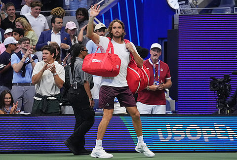 Stefanos Tsitsipas, of Greece, waves while leaving the court following a match against Ben Shelton, of the United States, during the fourth round of the U.S. Open tennis championships, Sunday, Sept. 6, 2026, in New York. 
