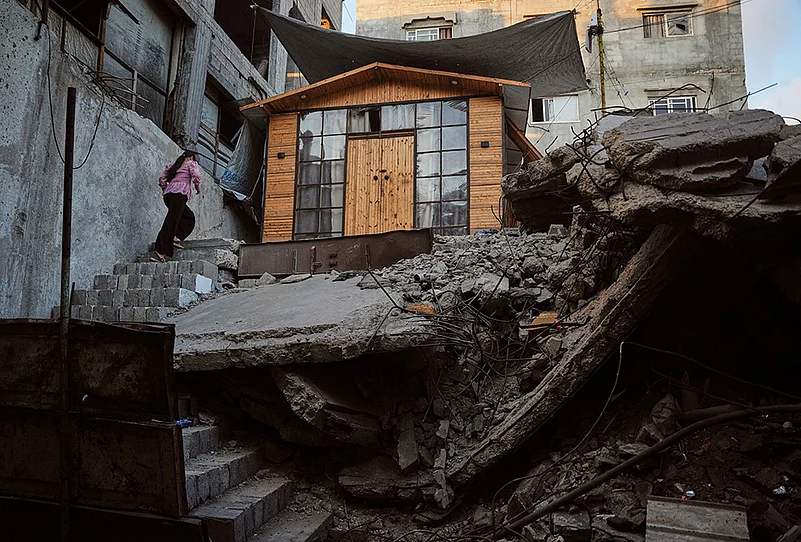 Rebuilding homes on Gaza rubble