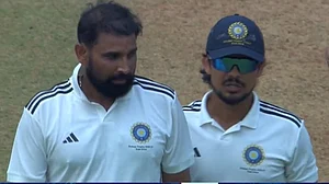 |Photo: X/@bccidomestic (screebgrab) : Mohammed Shami and East Zone Captain Ishan Kishan Celebrate After the Dismissal of Shaik Rasheed