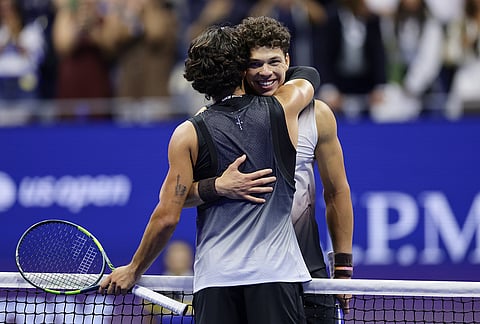 Ben Shelton, right, of the United States, is congratulated by Carlos Alcaraz, of Spain, after winning their match in the quarterfinal round of the U.S. Open tennis championships, Wednesday, Sept. 9, 2026, in New York. 
