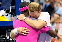 | Photo: AP/Yuki Iwamura : Frances Tiafoe, left, of the United States, and Alex Michelsen, of the United States, embrace after Tiafoe won their match in the quarterfinal round of the U.S. Open tennis championships, Tuesday, Sept. 8, 2026, in New York. 