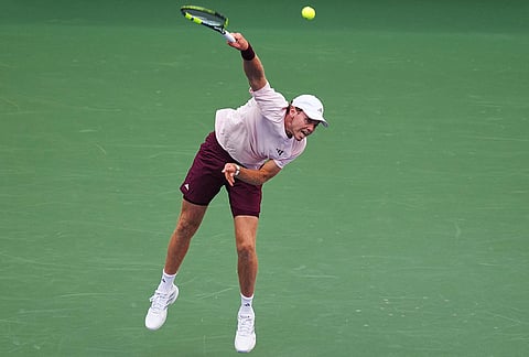 Alex Michelsen, of the United States, serves to Frances Tiafoe, of the United States, during the quarterfinal round of the U.S. Open tennis championships, Tuesday, Sept. 8, 2026, in New York.