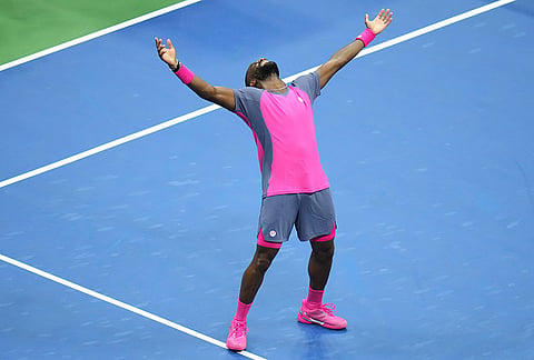 Frances Tiafoe, of the United States, celebrates winning a match against Alex Michelsen, of the United States, during the quarterfinal round of the U.S. Open tennis championships, Tuesday, Sept. 8, 2026, in New York.  