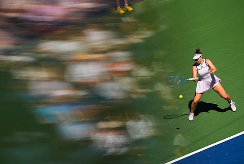 Linda Noskova, of the Czech Republic, returns the ball to Aryna Sabalenka, of Belarus, during the quarterfinal round of the U.S. Open tennis championships, Tuesday, Sept. 8, 2026, in New York. 