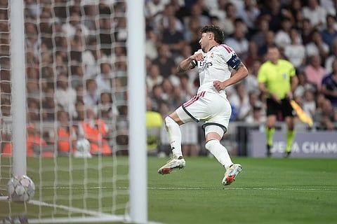 Real Madrid's Federico Valverde scores his side's second goal during a Champions League soccer match between Real Madrid and Inter Milan in Madrid, Spain.
