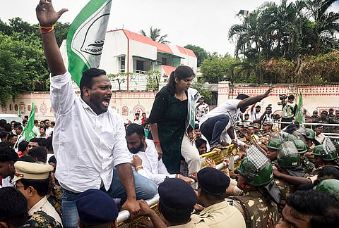 Police stop Biju Janata Dal (BJD) workers during a protest against the MMDR Amendment Act 2026 (Mines and Minerals (Development and Regulation) and demand its withdrawal, in Bhubaneswar.