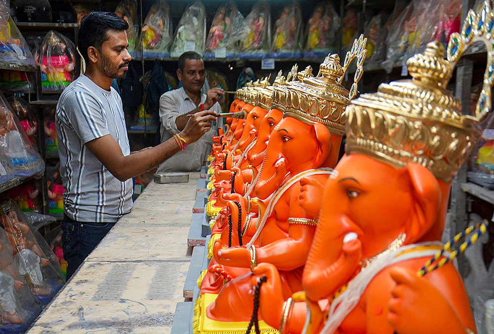 Artists work on idols of Lord Ganesh ahead of the 'Ganesh Chaturthi' festival, in Thane, Maharashtra, Wednesday, Sept. 9, 2026.  - | Photo: PTI