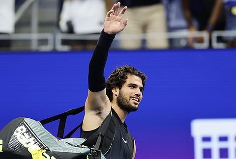 Carlos Alcaraz, of Spain, acknowledges the fans after losing to Ben Shelton, of the United States, in the quarterfinal round of the U.S. Open tennis championships, early Wednesday, Sept. 9, 2026, in New York. 