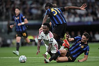 Real Madrid Vs Inter Milan, UCL: Los Blancos Hold Off The Nerazzurri 2-1 In Opener As Mbappé Matches Raúl's Record | Photo: AP/Bernat Armangue : Real Madrid's Vinicius Junior falls next to Inter Milan's Yann Bisseck and Benjamin Pavard during a Champions League soccer match between Real Madrid and Inter Milan in Madrid, Spain.