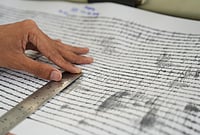 In Photos | Indonesia’s Anak Krakatau Erupts, Disrupting Flights and Triggering Rescue Search | Photo: AP/Dziki Oktomauliyadi : A technician measures the seismic readings from the eruption of Mount Anak Krakatau at an observation post in Pasauran, Banten province, Indonesia, Monday, Sept. 7, 2026.