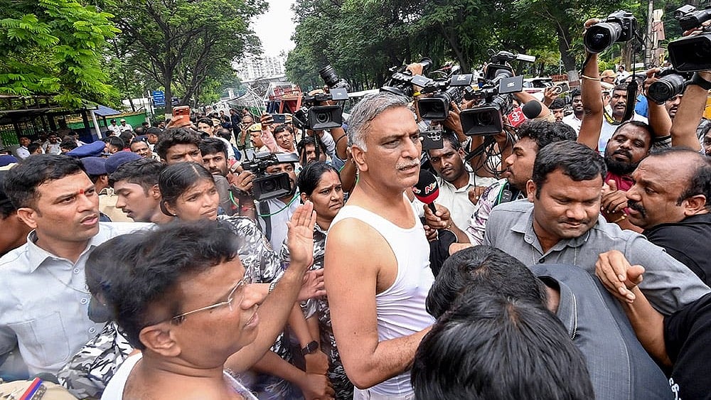 MLA T Harish Rao and other party leaders during a protest against the Congress government outside the Telangana Legislative Assembly on the opening day of the monsoon session, in Hyderabad. - Photo: PTI