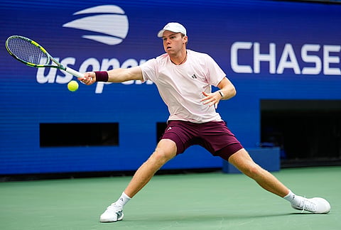 Alex Michelsen, of the United States, returns the ball to Frances Tiafoe, of the United States, during the quarterfinal round of the U.S. Open tennis championships, Tuesday, Sept. 8, 2026, in New York. 