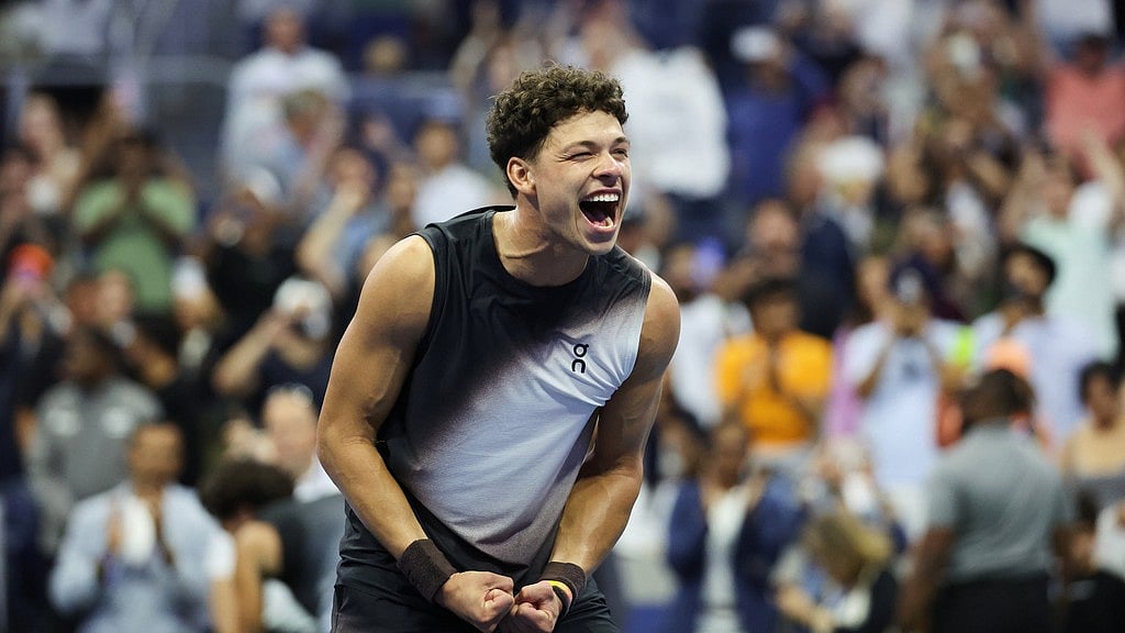 Ben Shelton, of the United States, celebrates after winning against Carlos Alcaraz, of Spain, in the quarterfinal round of the U.S. Open tennis championships. - Heather Khalifa/AP Photo