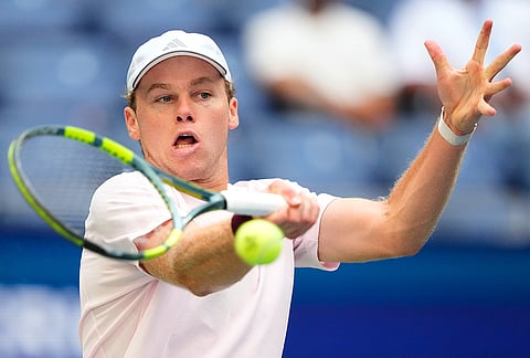 Alex Michelsen, of the United States, returns the ball to Frances Tiafoe, of the United States, during the quarterfinal round of the U.S. Open tennis championships, Tuesday, Sept. 8, 2026, in New York. 
