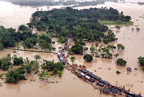 An aerial view shows makeshift shelters set up by flood-affected villagers on an embankment at Bhutni village in Manikchak block, Malda district, West Bengal.