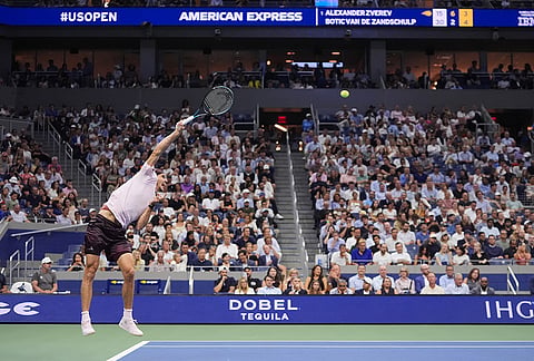 Alexander Zverev, of Germany, serves to Botic van de Zandschulp, of the Netherlands, during the quarterfinal round of the U.S. Open tennis championships, Wednesday, Sept. 9, 2026, in New York. 
