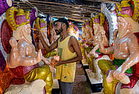 Day In Pics: September 10, 2026 | Photo: PTI : An artist prepares an idol of Lord Vishwakarma at a workshop ahead of the Vishwakarma Puja festival, in Gurugram, Haryana.