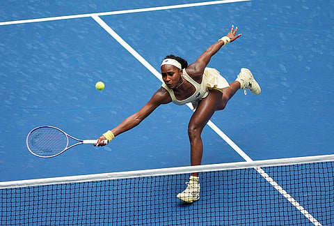 Coco Gauff, of the United States, returns the ball to Mirra Andreeva, of Russia, during the quarterfinal round of the U.S. Open tennis championships, Wednesday, Sept. 9, 2026, in New York. 