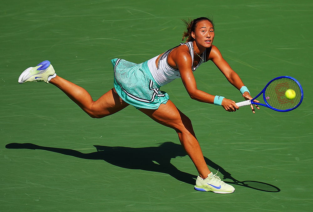Qinwen Zheng, of China, returns the ball to Elena Rybakina, of Kazakhstan, during the quarterfinal round of the U.S. Open tennis championships, Wednesday, Sept. 9, 2026, in New York. 