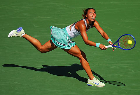 Qinwen Zheng, of China, returns the ball to Elena Rybakina, of Kazakhstan, during the quarterfinal round of the U.S. Open tennis championships, Wednesday, Sept. 9, 2026, in New York. 