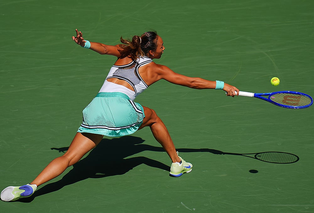 Qinwen Zheng, of China, returns the ball to Elena Rybakina, of Kazakhstan, during the quarterfinal round of the U.S. Open tennis championships, Wednesday, Sept. 9, 2026, in New York. 