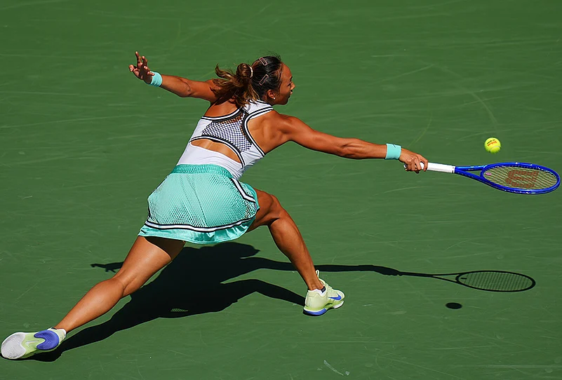 Qinwen Zheng, of China, returns the ball to Elena Rybakina, of Kazakhstan, during the quarterfinal round of the U.S. Open tennis championships, Wednesday, Sept. 9, 2026, in New York.