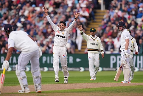 Pakistan's Muhammad Abbas celebrates taking the wicket of England's Jordan Cox, right, on day one of the third cricket Test between England and Pakistan in Birmingham, England, Wednesday, Sept. 9, 2026. 