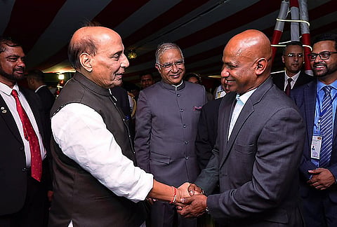 Defence Minister Rajnath Singh being greeted by former Sri Lankan cricketer Sanath Jayasuriya during an event, in Colombo. 