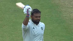 Kounain Quraishi raises bat to celebrate his maiden first-class century. - | Photo: Screengrab (JioHotstar)