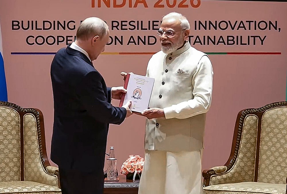 PM Modi presents ‘Thirukkural’ to President Putin