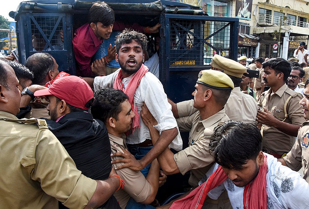 Samajwadi Party workers protest in Lucknow