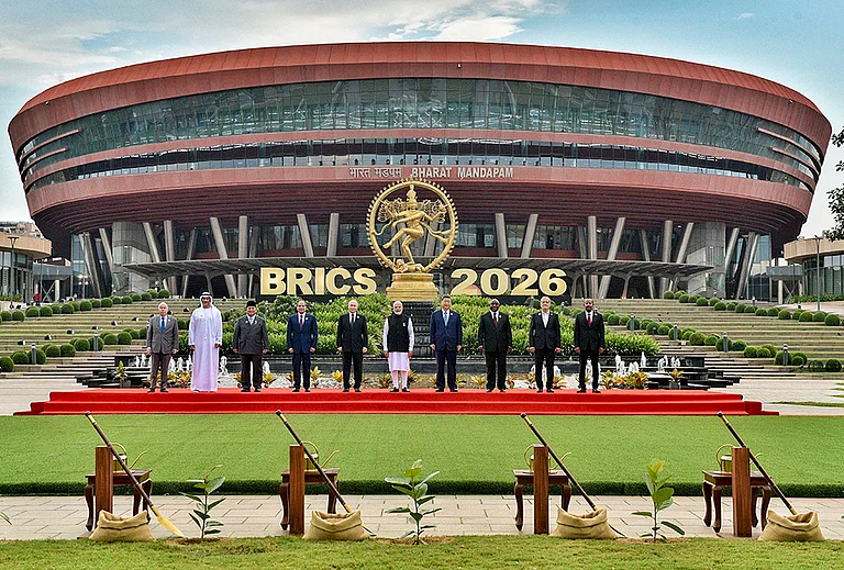From left, Brazil's Foreign Minister Mauro Vieira, Abu Dhabi Crown Prince Sheikh Khaled bin Mohamed bin Zayed Al Nahyan, Indonesian President Prabowo Subianto, Egyptian President Abdel Fattah el-Sisi, Russian President Vladimir Putin, Prime Minister Narendra Modi, Chinese President Xi Jinping, South African President Cyril Ramaphosa, Iranian President Masoud Pezeshkian and Ethiopian Prime Minister Abiy Ahmed Ali pose for a group photograph amid the ongoing 18th BRICS Summit, at the Bharat Mandapam, in New Delhi.
- | Photo: MEA via PTI