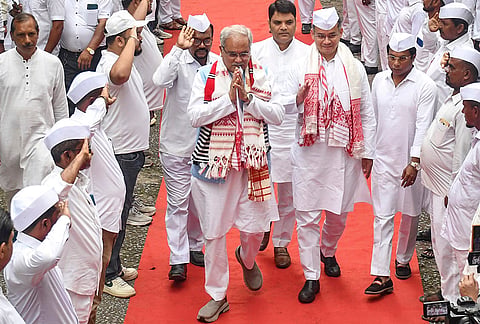 Newly-appointed Assam Congress in-charge and party General Secretary Bhupesh Baghel, accompanied by state party President Gaurav Gogoi, being received by party workers upon his arrival at the party office, to attend a meeting for the upcoming Nagaon Lok Sabha by-election, in Guwahati.