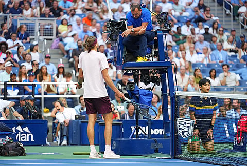 Alexander Zverev, of Germany, talks to the chair umpire during a match against Karen Khachanov, of Russia, during the men's singles semifinals of the U.S. Open tennis championships, Friday, Sept. 11, 2026, in New York. 