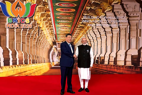 Prime Minister Narendra Modi receives Chinese President Xi Jinping before the 18th BRICS Summit, at Bharat Mandapam, in New Delhi. 
