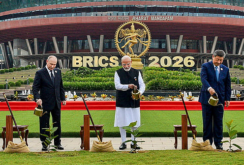 Prime Minister Narendra Modi with Russian President Vladimir Putin and Chinese President Xi Jinping during a joint tree plantation initiative amid the ongoing 18th BRICS Summit, at the Bharat Mandapam, in New Delhi. 