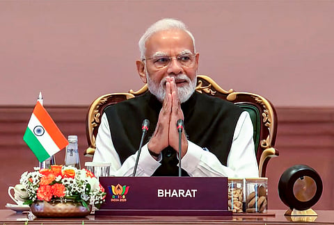 Prime Minister Narendra Modi greets the gathering during the 18th BRICS Summit, at the Bharat Mandapam, in New Delhi. 